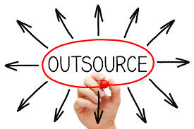 Business owner working with an IT service provider to outsource IT support in Wisconsin