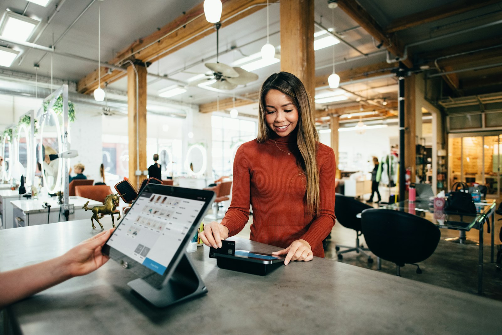 Retail employee using a point of sale system